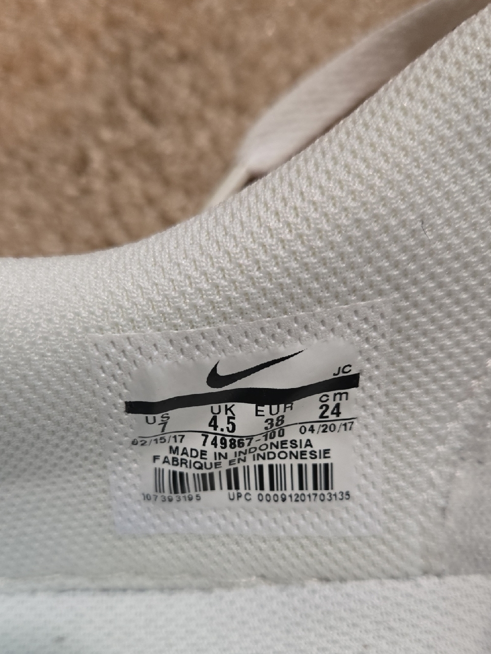 Nike All-White Low-Top Leather Sneakers - Picture 4 of 5